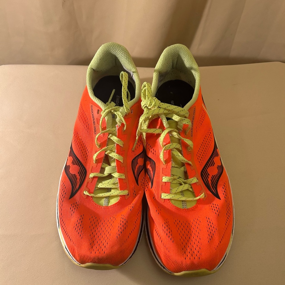 Saucony Bright Orange Running Shoes with Green Accents